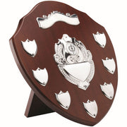 MAHOGANY SHIELD WITH CHROME FRONTS AND 7 RECORD SHIELDS (1in CENTRE) - 11in