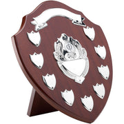 MAHOGANY SHIELD WITH CHROME FRONTS AND 9 RECORD SHIELDS (1in CENTRE) - 12.75in