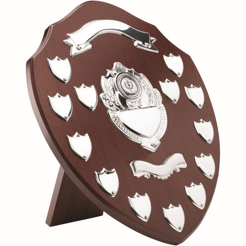 MAHOGANY SHIELD WITH CHROME FRONTS AND 13 RECORD SHIELDS (1in CENTRE) - 14in
