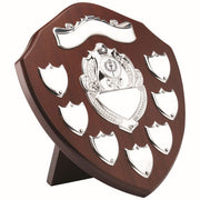 MAHOGANY SHIELD WITH CHROME FRONT AND 7 RECORD SHIELDS (1in CENTRE) - 9in