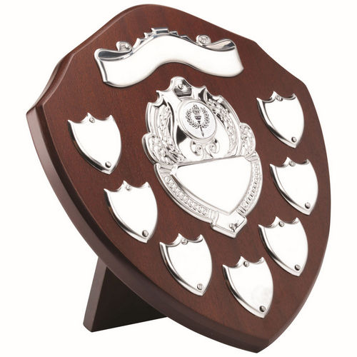 MAHOGANY SHIELD WITH CHROME FRONT AND 7 RECORD SHIELDS (1in CENTRE) - 9in